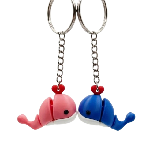 Dos llaveros de ballena, uno rosa y uno azul, incluidos de regalo